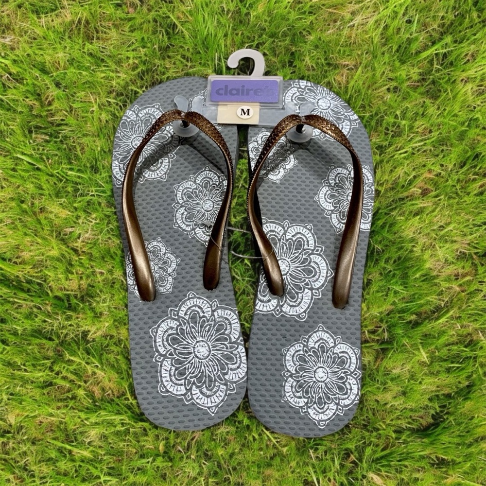 Claire's Gray Flip Flops with White Floral Pattern